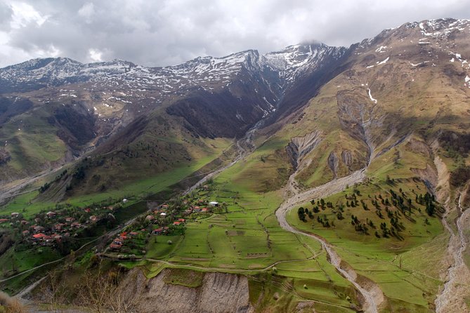 Adventure in Caucasus - Private Tour to Jinvali, Ananuri, Gudauri, Kazbegi - Stop 3: Russian-Georgian Friendship Monument Area, Military Highway, and Paragliding