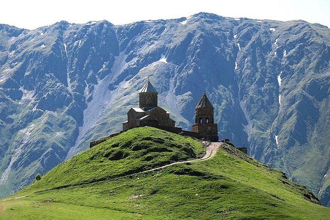 Caucasus mountains full day Private Tour Ananuri-Gudauri-Kazbegi - Stop 4: Stepantsminda and Gergeti Trinity Church, hike or jeep to the hilltop