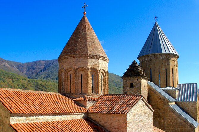Day Trip to Kazbegi and Gudauri - Ananuri Fortress Ensemble: late Middle Ages stone with church details worth pausing for