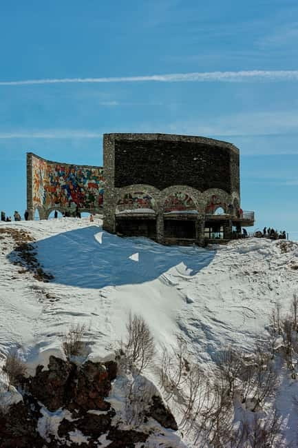 From Tbilisi: Ananuri, Gudauri, and Kazbegi Tour with Guide - Zhinvali Reservoir: turquoise water, mountain framing, and a quick reset