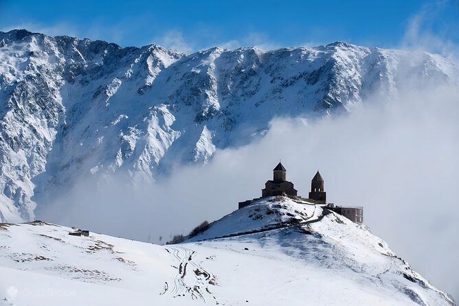 From Tbilisi Daytrip Kazbegi Gudauri & Zhinvali Guided Group Tour - Stepantsminda and the Kazbegi area: setting up the Gergeti moment