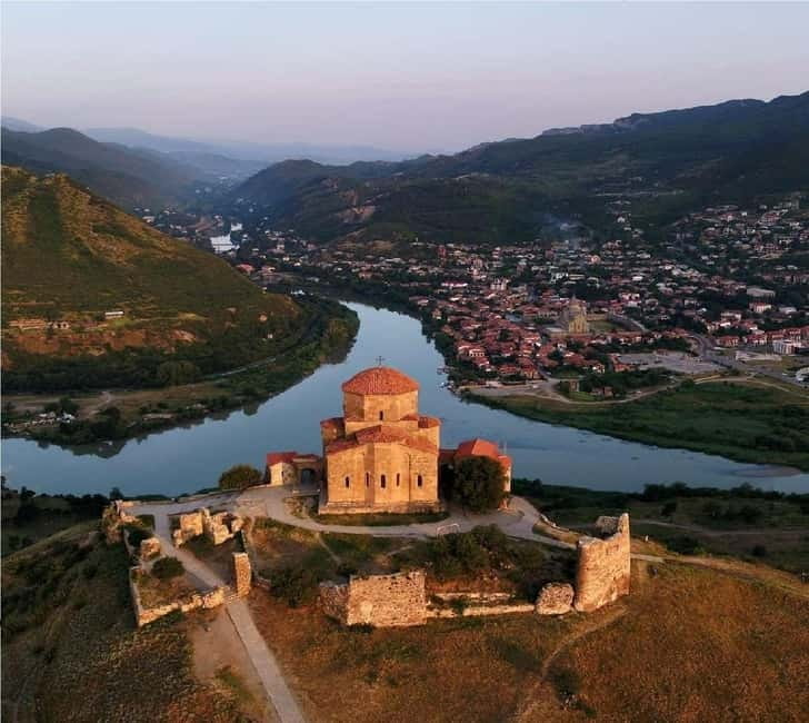 From Tbilisi: Gori and Uplistsikhe Group Tour - Svetitskhoveli Cathedral: UNESCO architecture, frescoes, and carved details