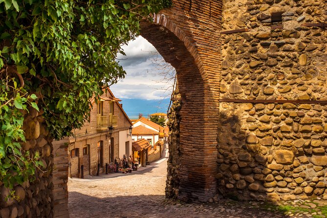 From Tbilisi Magical Kakheti - Sighnaghi, Bodbe & Chronicles Tour - Signagi Old Town: Cobblestone Streets, Balcony Color, and Free Time to Roam