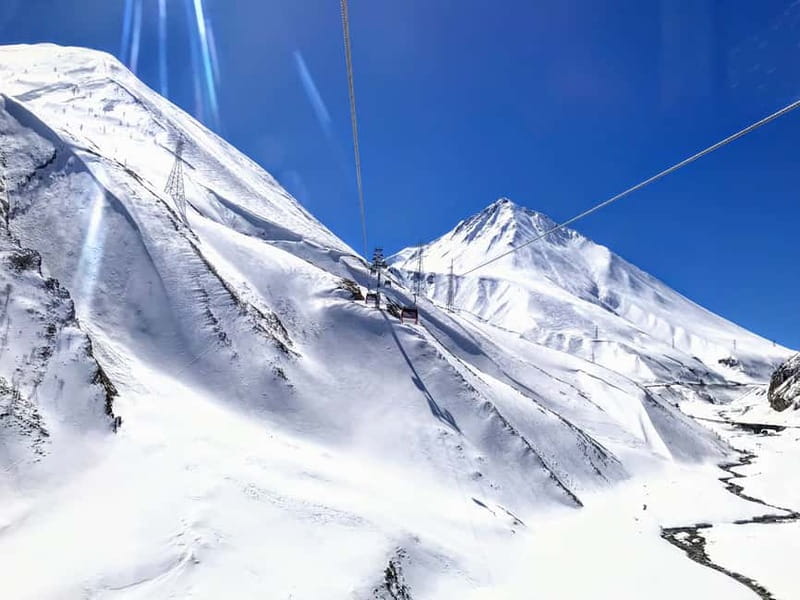 From Tbilisi: Private Sabaduri, Ananuri, & Gudauri Day Trip - Gudauri at altitude: skiing options, cable car costs, and snow thrills
