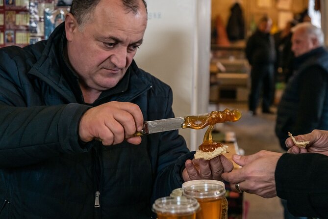 Half-Day Food Tour of Tbilisi Dezerter's Bazaar - From stalls to lunch: Ghobi, Tonis lobiani, and Tkemali at a local restaurant