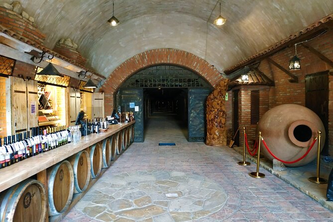 Kakheti Wine Tour with 20+ Wine Tastings & Qvevri Masterclass - Kindzmarauli Corporation Wine House: Production Stages and Bottling Insight