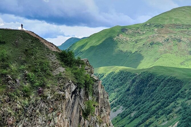 Kazbegi full day private tour + LUNCH - Stop 3: Gudauri Friendship Monument, a 1983 roadside marker with a climb