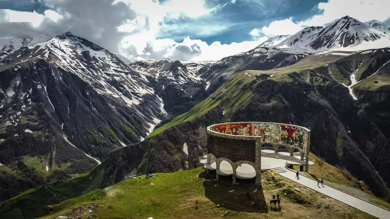 Kazbegi Tour with Fantastic Views of Caucasus Mountains - Gudauri Freedom Arch: a big symbol with big views