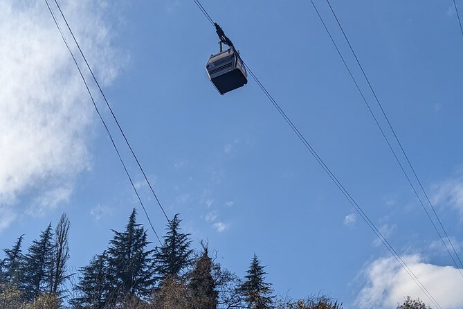 Kutaisi: Chiatura Cable Cars & Katskhi Pillar Guided Tour - Mgvimevi Monastery: a rock-carved convent stop that feels remote