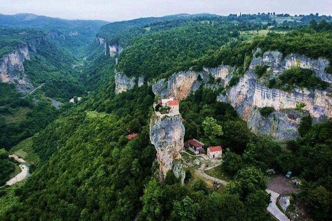 Kutaisi:Chiatura Tour with Katskhi Pillar & Cable Car Experience - Mgvimevi Cave Monastery: cave churches and a calmer pace