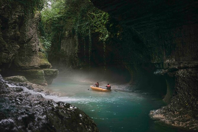 Martvili Canyon Prometheus Cave And Hot Springs From Batumi - Prometheus Cave: underground lakes, frozen-stone shapes, and a boat on the river
