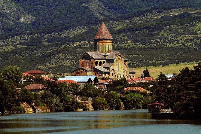 One Day Tour to Tbilisi and Mtskheta - Stop 1: Holy Trinity Cathedral, Big Scale and Serious Atmosphere