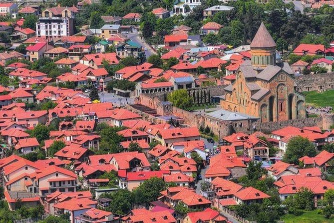 Private 4-Day Tours & Transfers from Tbilisi to Top Georgia Spots - Day 1 in Tbilisi: Bazaars, Peace Bridge Lights, Old Streets, and Mtatsminda Views
