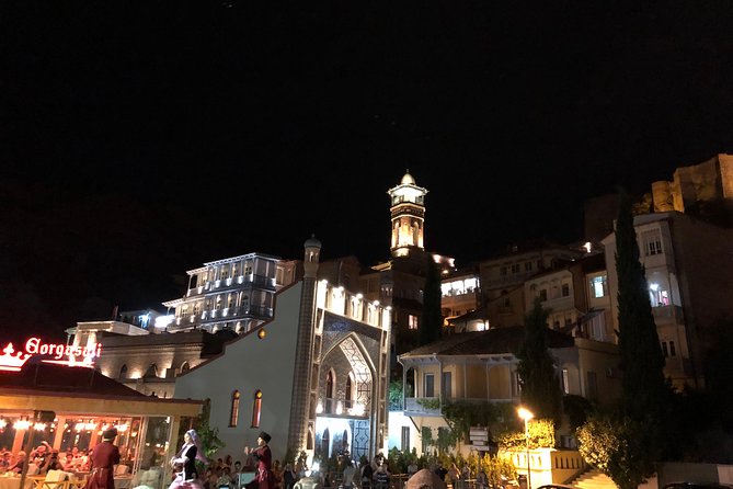 Tbilisi by Night Walking Tour - Rezo Gabriadze marionette theater, the clock tower bell, and the Circle of Life at 7pm