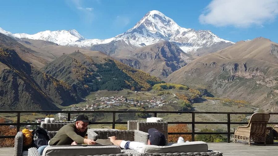 Tbilisi: Caucasus Mountains Private Trip with a Local - Stepantsminda base and the climb to Gergeti Trinity Church at 2170 meters