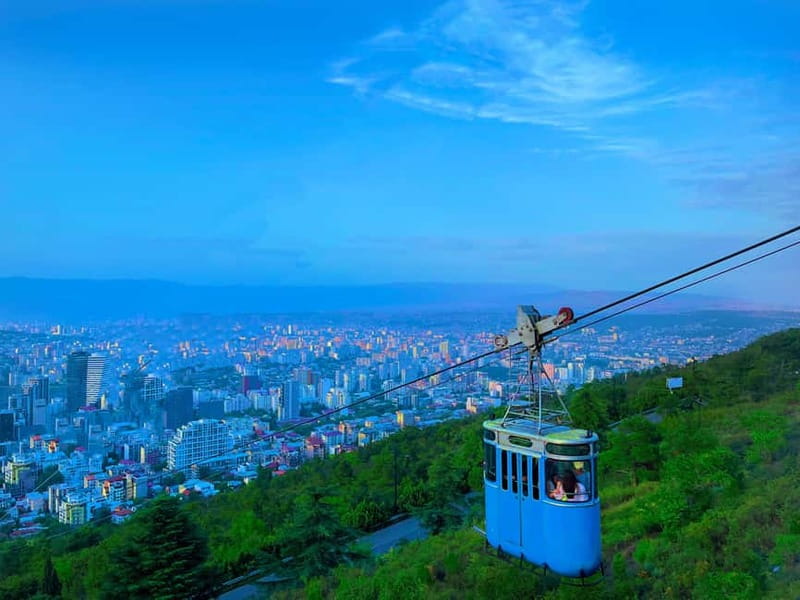Tbilisi: Chronicle of Georgia, Old-town, Lake & 2 Cable Cars - Modern cable car, Rike Park, and the Old Town descent