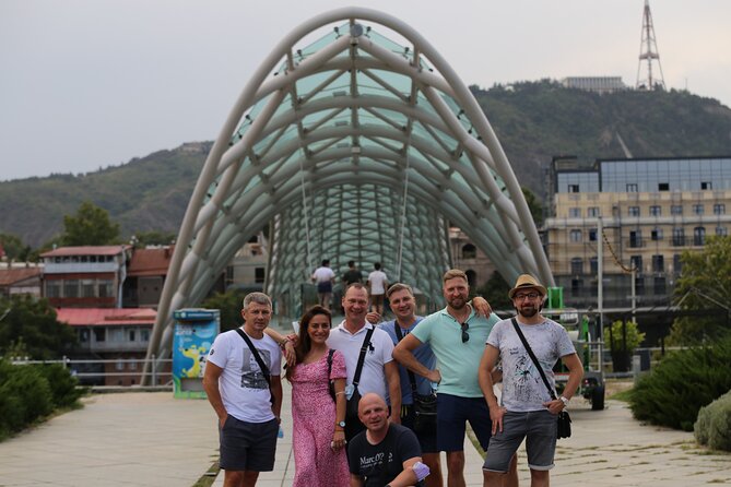 Tbilisi city tour PRIVATE excursion Airport and hotel pickup INCL - Chronicles of Georgia: a big monument near Tbilisi lake