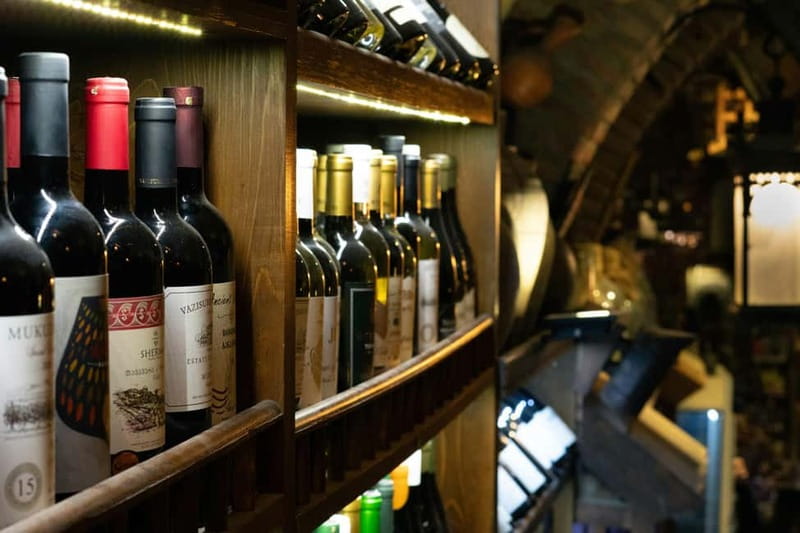 Tbilisi: Georgian Dinner with Wine and Tamada (Toastmaster) - Georgian toasts and unlimited wine, with real dinner at the center