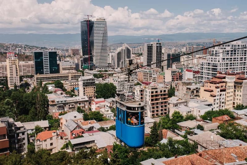 Tbilisi: Historic & Modern City tour with 2 Cable Car rides - Meeting up, then getting moving fast from your hotel