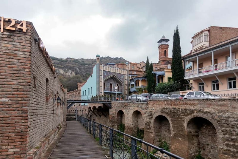 Tbilisi: Sightseeing Tour, Wine or Beer Tasting, & Cable Car - Metekhi Church, Rike Park, and the Bridge of Peace river walk