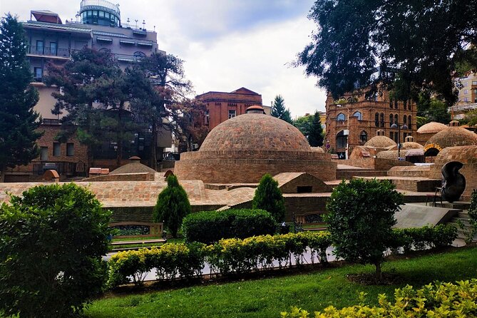 Tbilisi Walking Tour with Cable Car, Wine Tasting & Bread Bite - Stop 2: Metekhi Cathedral, an old church with a complicated past