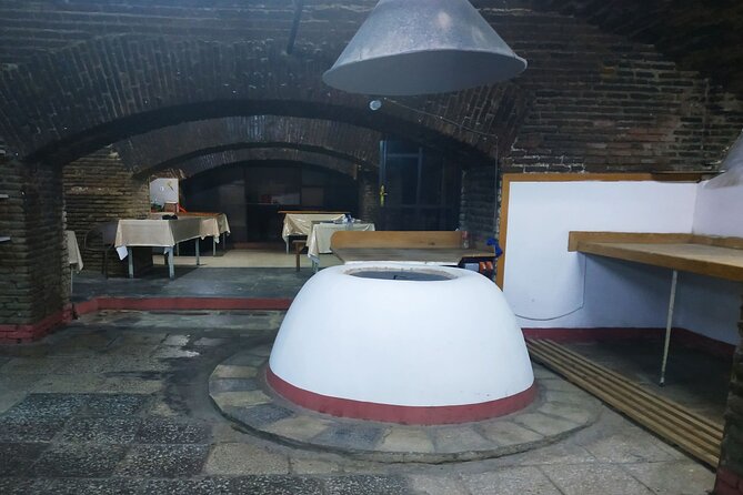 Tbilisi Walking Tour with Cable Car, Wine Tasting & Bread Bite - Stop 5: Sulfur Bath area and Leghvtakhevi Waterfall, the spa side of Georgia