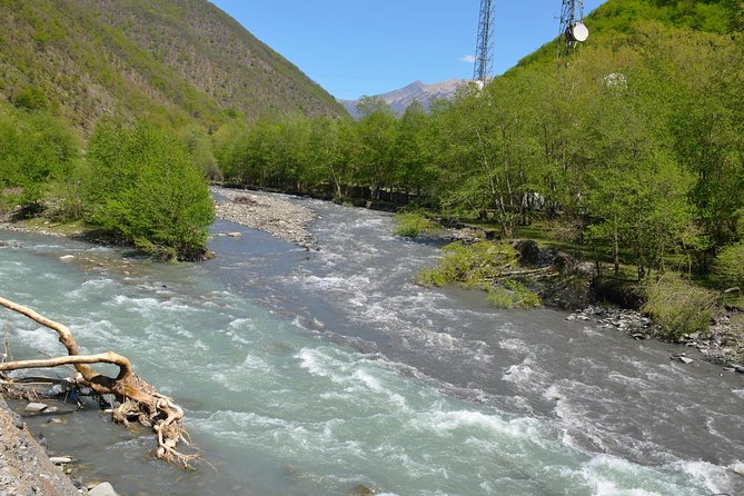 Tour to Kazbegi: Georgian Military Road - Ananuri - Gudaury - Kazbegi - Ananuri Fortress Ensemble: Active Churches, Carved Stone, and a Stone Well
